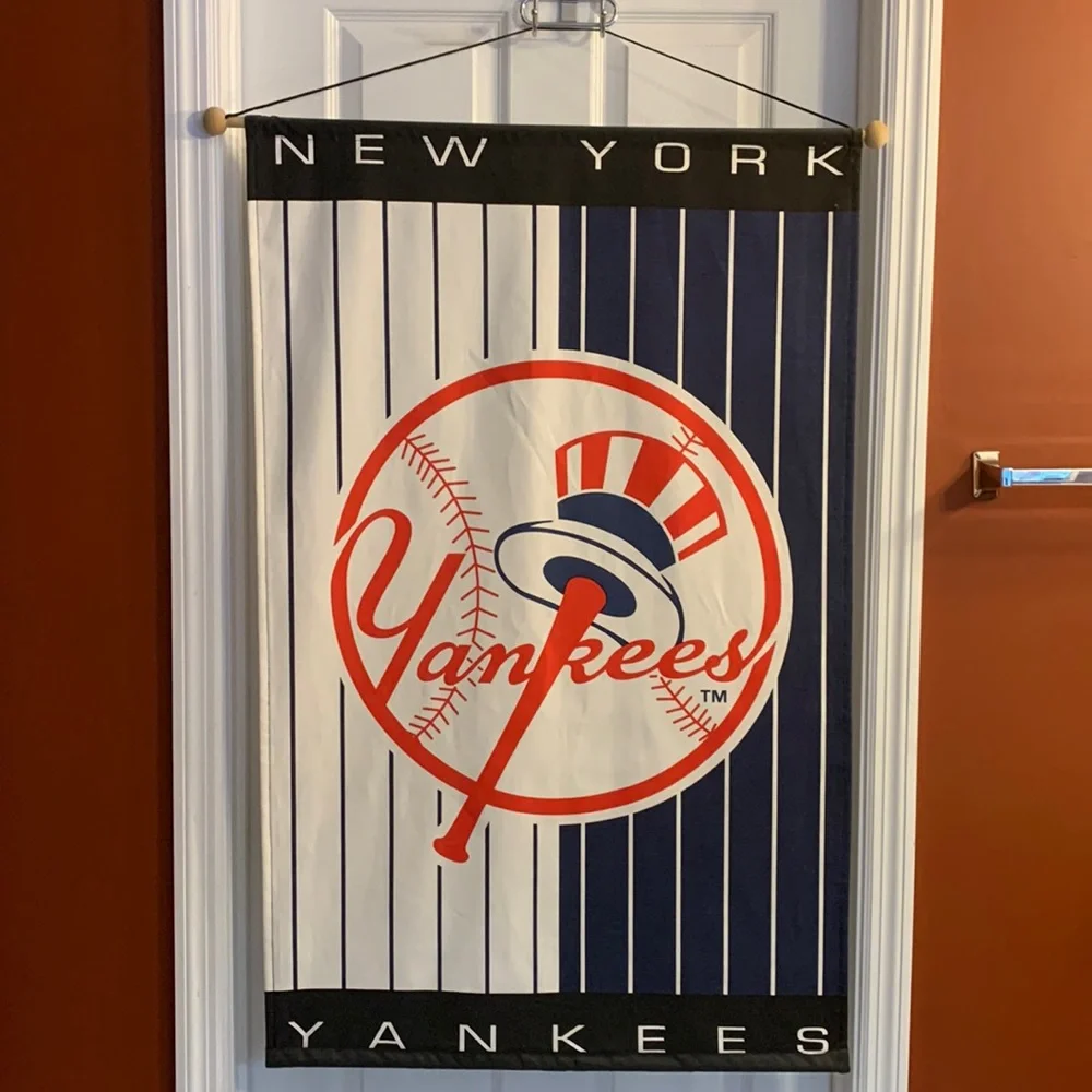 Large New York Yankees banner, with wooden dowel